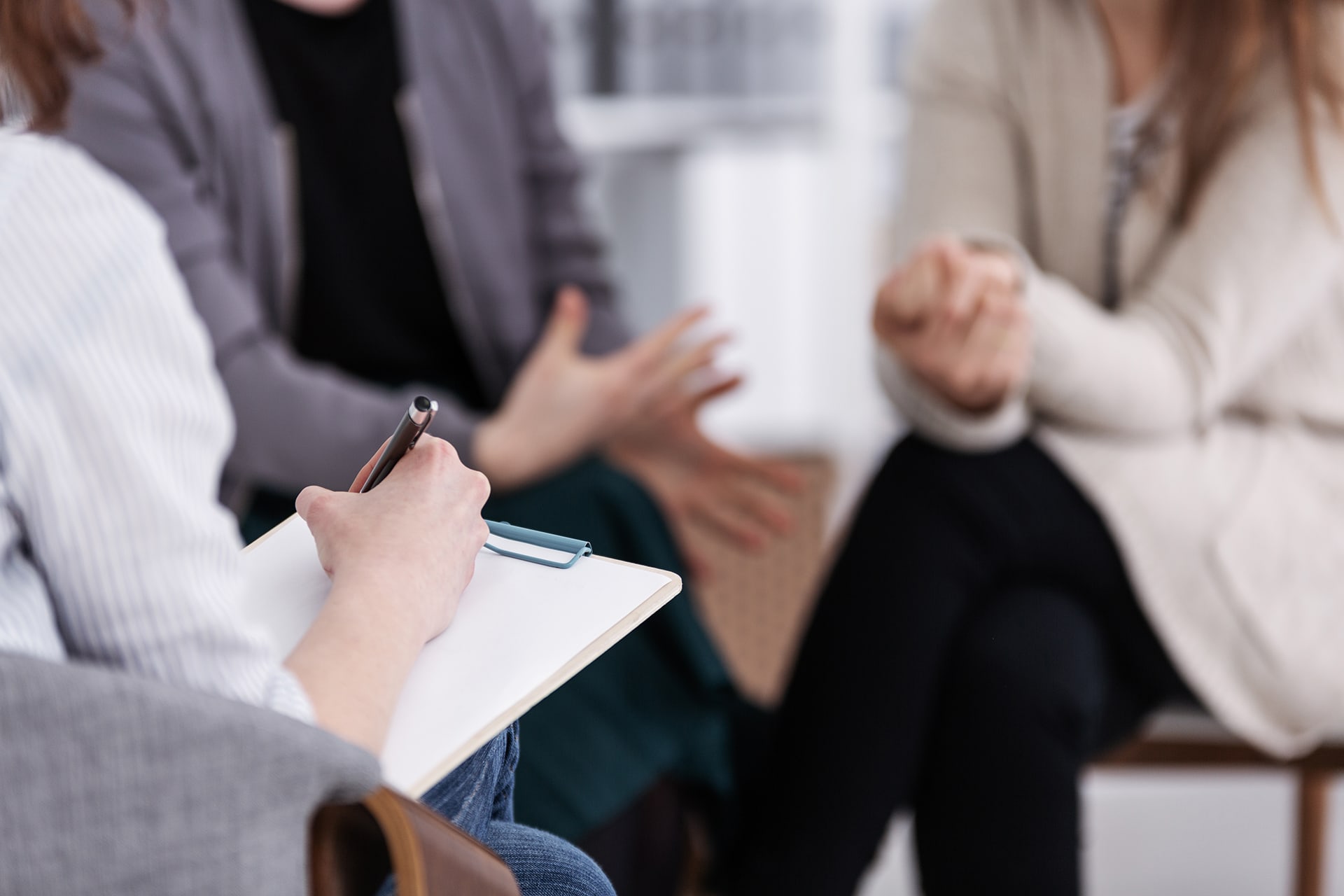 A positive behaviour support practitioner working with a client